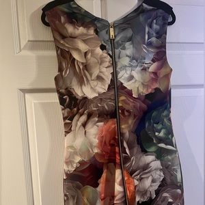 Ted Baker floral midi dress. Exposed zipper in the back. Fitted classy & sexy.